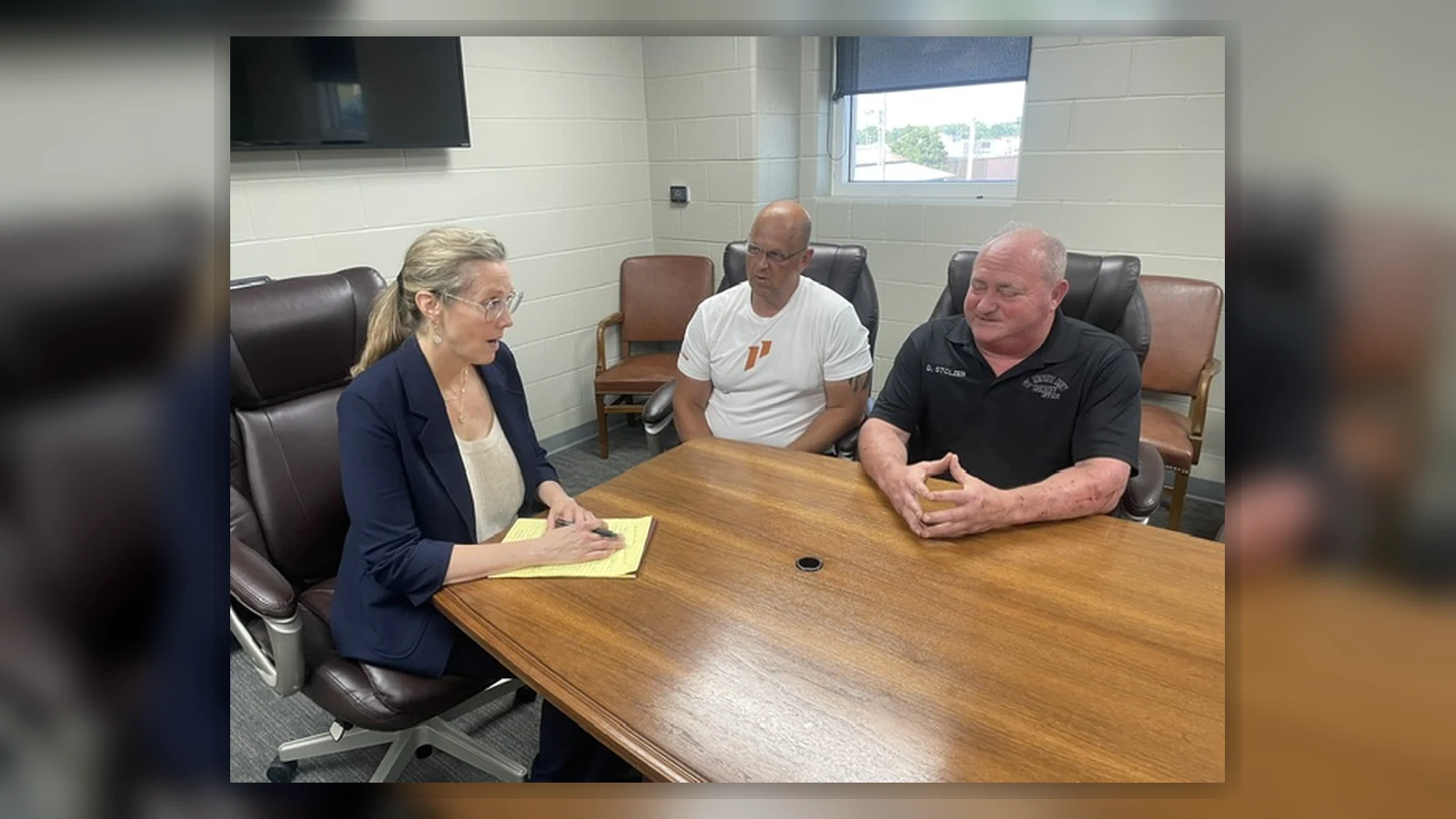 Elizabeth Sparks-Holmes meeting with Ste. Genevieve County law enforcement officials during a facility visit.